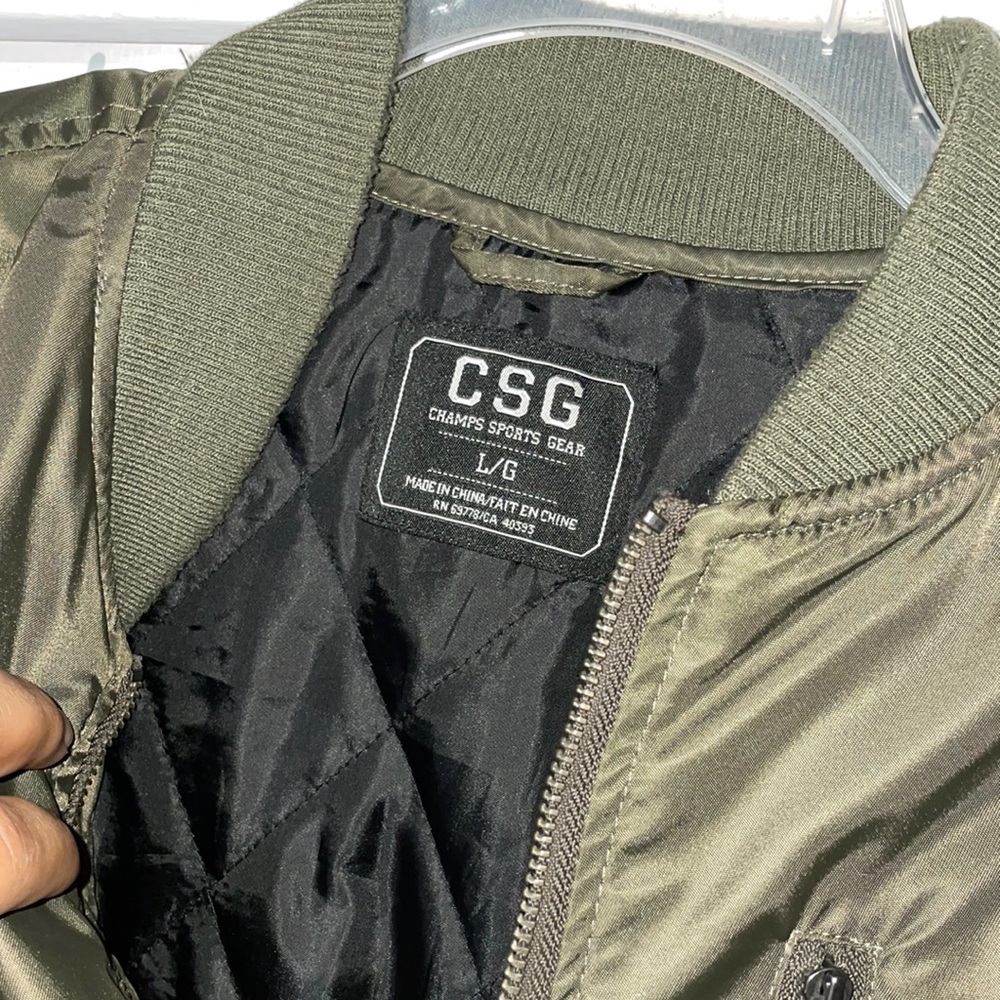 Green bomber jacket.
